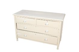 A vintage pine chest of drawers.