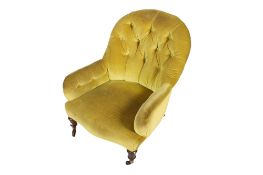 A Victorian button back salon chair.