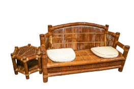 A bamboo sofa and a table.