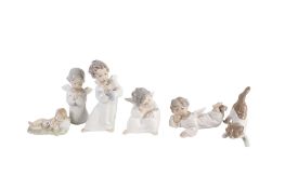 Six Lladro figures.