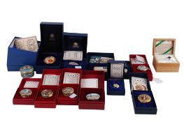 A collection of Halcyon Days enamel boxes and a Canadian stone and jade polar bear. All boxed.