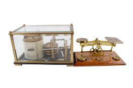 A 20th century FCC Precision barograph and a letter scales with weights. Max.
