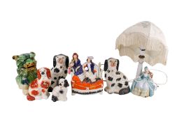 A collection of mostly Staffordshire pottery items.