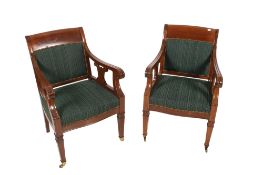 A pair of 20th century French mahogany carver chairs.