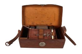 A brown leather travelling vanity case. Stamped 'J.H.H.