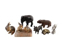 Seven assorted small animal figures. Including a bronze corgi dog and a Black Forest bear, etc. Max.
