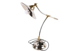 A contemporary Libra chrome and brass desk lamp.