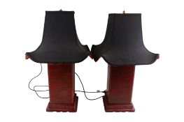 A pair of contemporary Chinese style table lamps. Decorated with images of the emperor and empress.