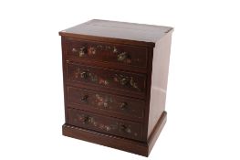 An Edwardian mahogany table top chest of drawers.