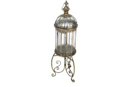 A vintage brass framed candle lantern.