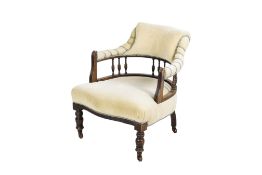 A Victorian mahogany framed open armchair.