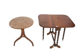 A mahogany tripod table and a gateleg table.