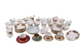 A group of assorted porcelain cups and saucers. Including Old Country Roses, etc.