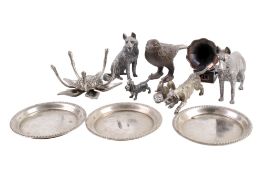 An assortment of cast metal animal figurines. Including dogs and birds. Max.