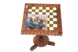 A 20th century chess table and set of pieces.