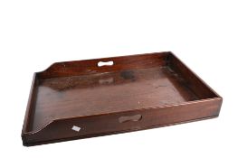 A Victorian mahogany tray. Of rectangular form with handles, H9.5cm x W76cm x D49.