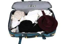 An assortment of vintage textiles and accessories.