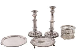 A small group of four silverplated tableware.