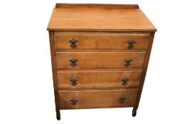 A 20th century oak chest of drawers.