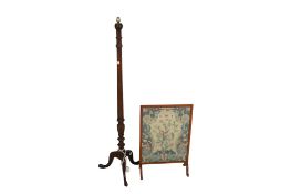 An early 20th century fire screen and a mahogany standard lamp base.