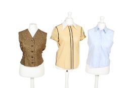 Two designer ladies blouses and a waistcoat.