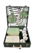 A vintage Brexton picnic set mostly for four. Including plates, cups and saucers, etc.