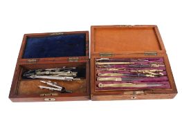 Two 19th century and later wooden boxed writing sets.