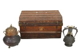 A group of three assorted metal items.