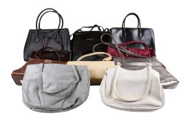 A collection of ladies handbags.
