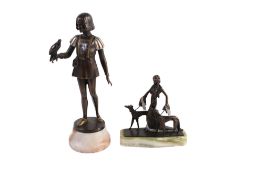 Two Art Deco style bronze effect figures. Including one modelled as a nave with a falcon signed 'G.