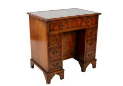 A Georgian style mahogany knee hole desk.