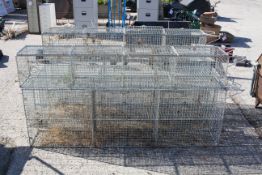 A set of five wire mesh freestanding locker units. Consisting of 3 x 6 and 2 x 4.