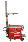 A MIG welder and a mobile lift All items in this auction are sold as seen, We are unable to
