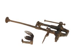 A large black smith's vice and a cobblers shoe last. Vice length 100cm. All items in this auction