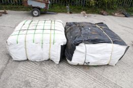 Two bails of sacks. One bail with dimensions 90 x 90 x 155 marked on the side. Unknown quantity,