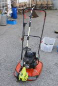 A Honda Flymo petrol lawnmower and a strimmer. (2). All items in this auction are sold as seen, We