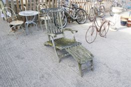 A hardwood garden steamer sun lounger chair. All items in this auction are sold as seen, We are