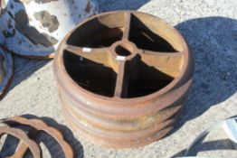 A set of four cast iron shepherd hut style wheels