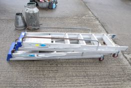 Two Clow aluminium stepladders. Each with handrails and wheels. Erected max height 177cm. All