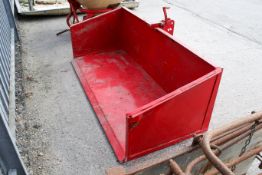 A red tractor box universal. H72cm x W192cm x D82cm All items in this auction are sold as seen, We