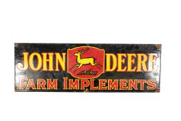 A large John Deere Farm Implements enamel advertising sign. Single sided. H30.5cm W61.5cm. All items