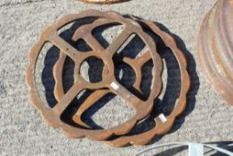 Two cast iron wheels