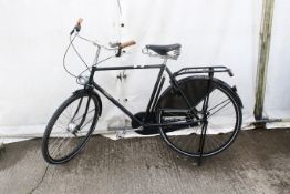 A black Pashley Sovereign gentlemens bicycle. Appears complete, with stand, tyre pump, tyre