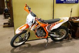 A BSE 250cc 4-stroke Greenlane Enduro Motorbike. Styled as a KTM tribute with a Honda CRF style