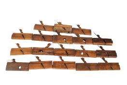 A collelction of vintage wooden wood working planes. Most approximately 25cm long. All items in this
