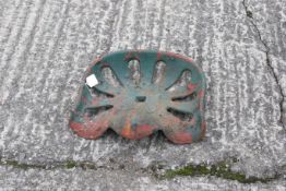 An unbranded vintage cast iron tractor seat. W37cm D35cm. All items in this auction are sold as