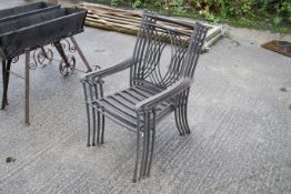 A set of four metal stacking garden chairs. H96cm All items in this auction are sold as seen, We are