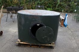 A large metal above-ground water or oil storage tank. Painted green. H94cm W137cm D100cm. All
