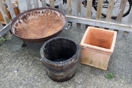 Two garden planters and a metal fire pit. To include a coopered oak barrel planter (H35cm C41cm) and