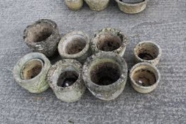 Group of nine assorted concrete garden plant pots. Max. H28cm All items in this auction are sold